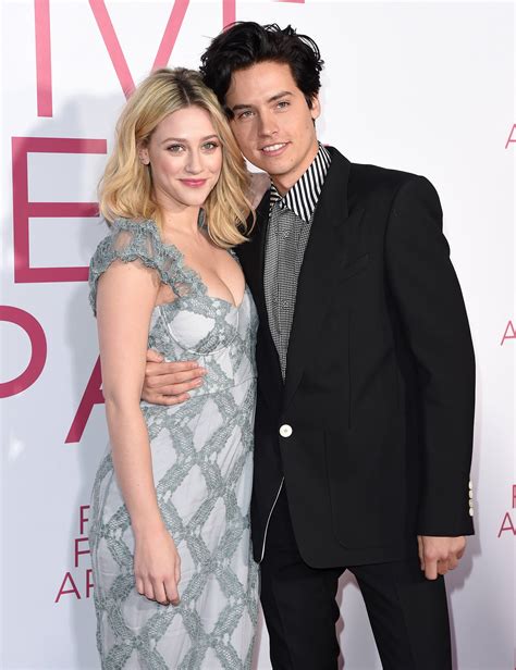 Cole Sprouse Takes A Bite Out Of Lili Reinharts Neck In Steamy New