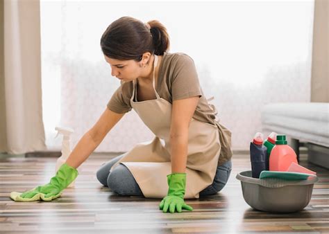 Woman With Gloves Cleaning Floor Free Photo