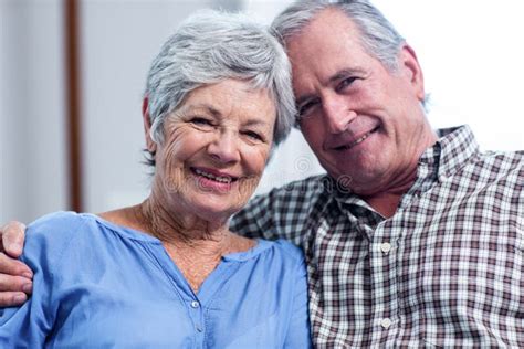 Portrait Of Senior Couple Embracing Each Other Stock Image Image Of Apartment Camera 68284523