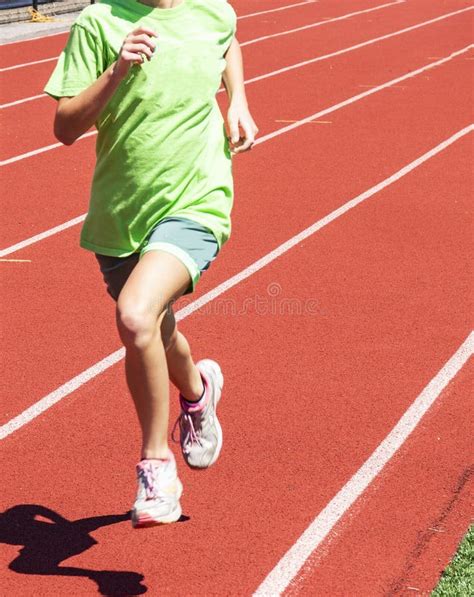 Young Girl Running On A Red Track Stock Image Image Of Running