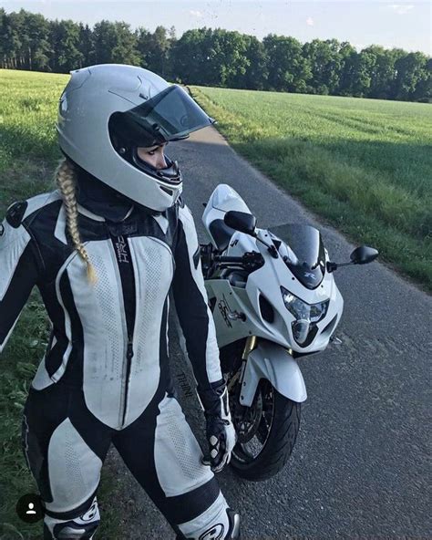Blonde Ponytail Girl In Black White Leather Motorcycle Riding Jumpsuit
