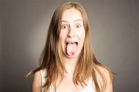 Woman Showing Tongue Stock Photo Download Image Now Tongue Women