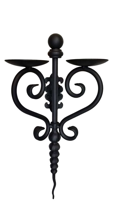 Enjoy a nice variety of primitive candle holders! Wrought Iron Wall Sconce-Unique Craftsmanship in Handmade ...