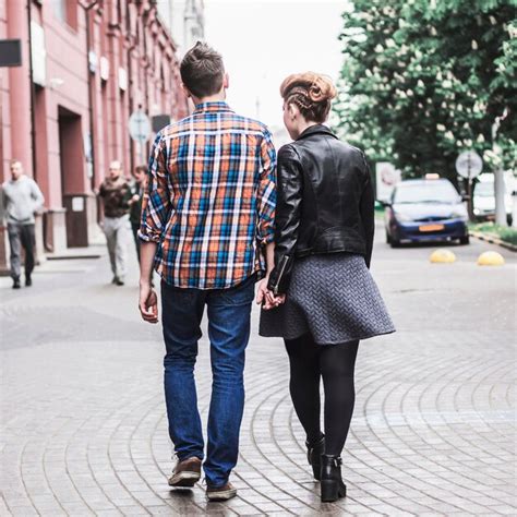 Premium Photo Couple In Love Walking Down The Streets Of The Big City