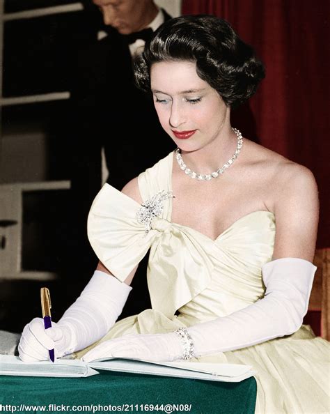 October 20 1956 Princess Margaret signing the Visitors Book during her visit to the European ...
