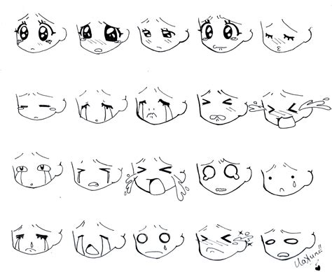 Various Facial Expressions Drawn By Hand With Black Ink On White Paper