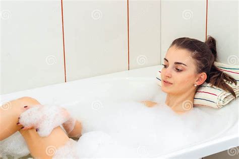 Young Girl Relaxes In A Hot Tub With Foam Stock Image Image Of Home Clean 94000469