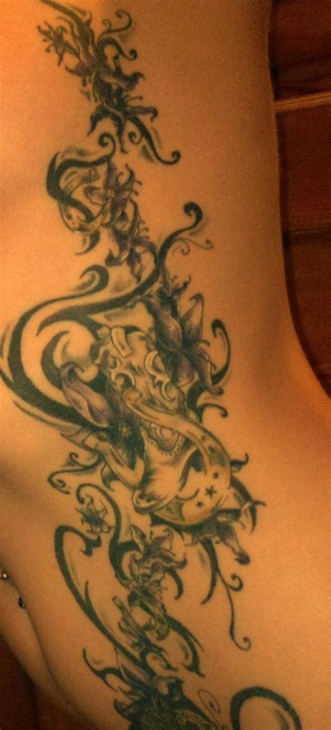 Small tribal tattoos for girls. 15 Cool Rib Tattoos