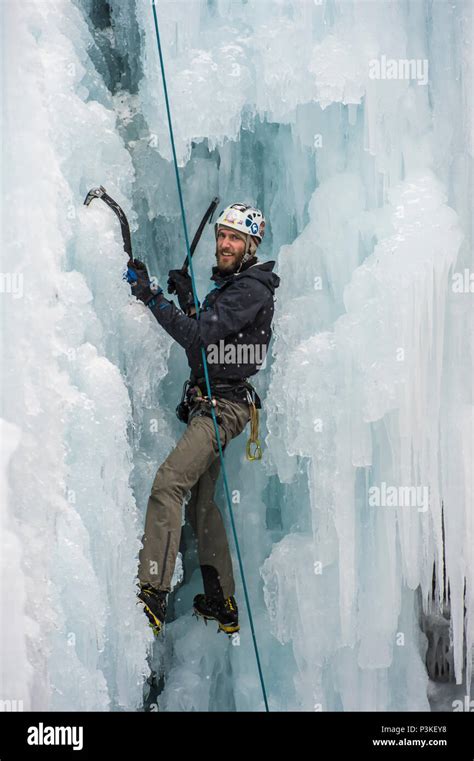 Climber Ascending Ice Wall In Ouray Ice Park Colorado Usa Stock Photo