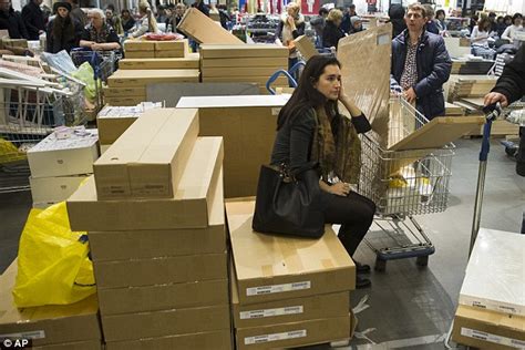 Russian Shoppers Queue To Panic Buy Big Ticket Items Amid Fears Of