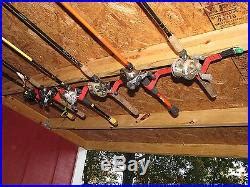 It consists of 1 x 4's, some 1/4x20 bolts and some sidewalk. ceiling | Fishing Rod Holder