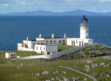 Neist point lighthouse has been located there since 1909. Neist Point lighthouse on the Isle of Skye looking towards ...