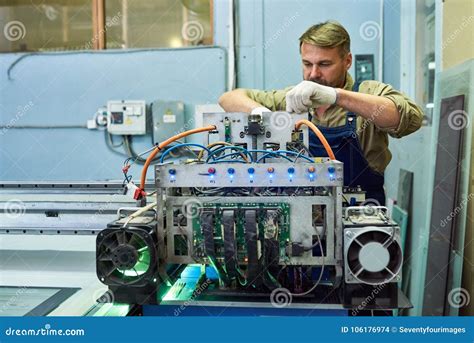 Mechanic Fixing Machine At Factory Stock Photo Image Of Fixing
