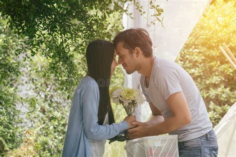 Loving Couple With Flowers Stock Photo Image Of Romantic 95565244