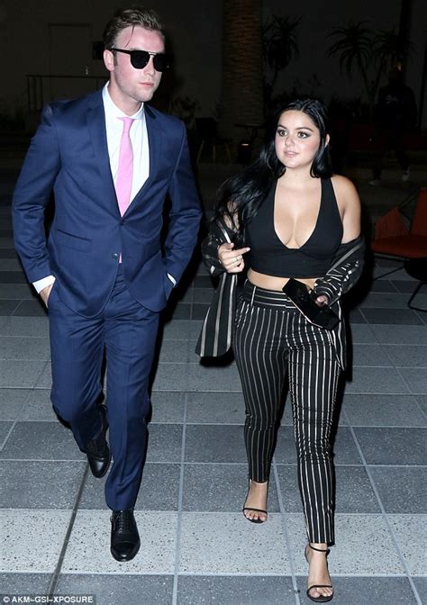 Ariel Winter Flashes Cleavage In Low Cut Crop Top And Striped Suit As