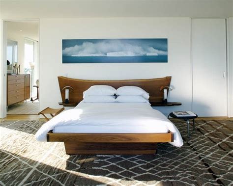Palette of black, taupe and white is a subtle complement to its earthy abstract design. Art Above Headboard Ideas, Pictures, Remodel and Decor