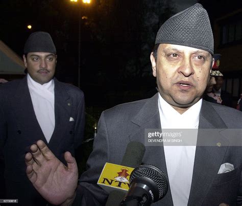 nepal s king gyanendra is watched by his son crown prince paras as he news photo getty images