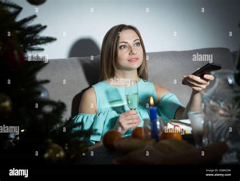 Woman Watching Tv Alone Hi Res Stock Photography And Images Alamy