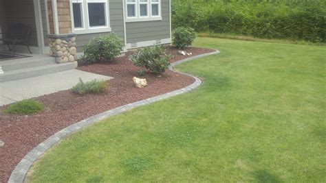 These stones are extremely durable to ensure they hold up against all of the outdoor elements. Two tone gray running stone | Complete Landscape Edging