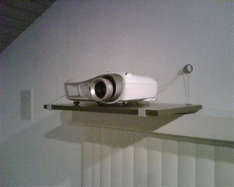 Where to hang ceiling projector screens. shelf for projector in living roomm | Projector shelf ...