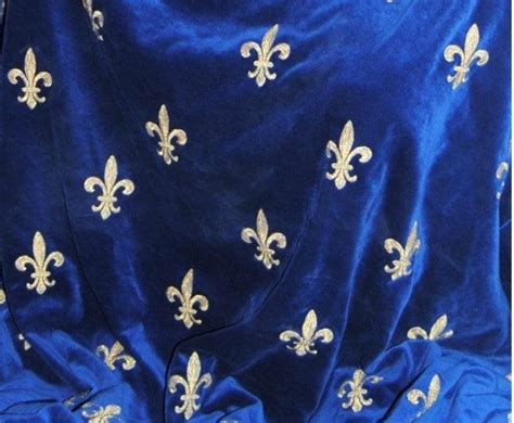Blue And Gold Fleur De Lis Velvet Fabric With White Embroidery On The Back