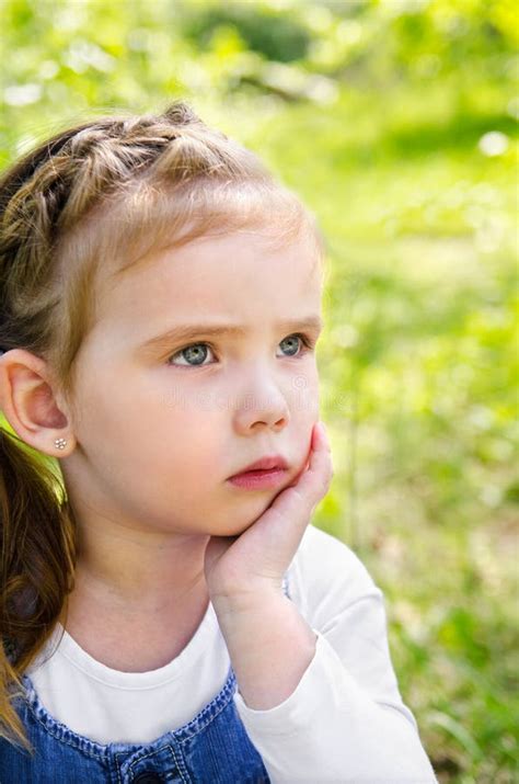 Portrait Of Thinking Little Girl Outdoor Stock Photo Image Of Spring