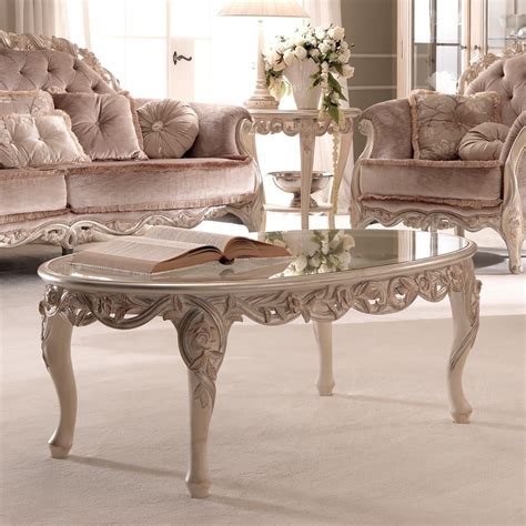 This hand carved coffee table will complete your living room & will give you elegant look and spare space to tidy up your room. Reproduction Italian Oval Coffee Table (With images ...