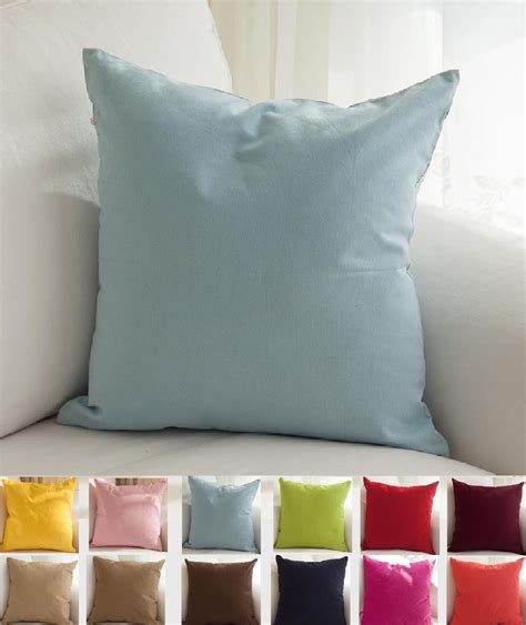 A blue sofa is a hot trend at the moment, for good reason. Decorating Sofa with Light Blue Throw Pillows | Decor on ...