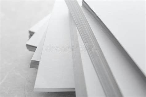 Stack Of Blank Paper Sheets On Wooden Table Brochure Design Stock
