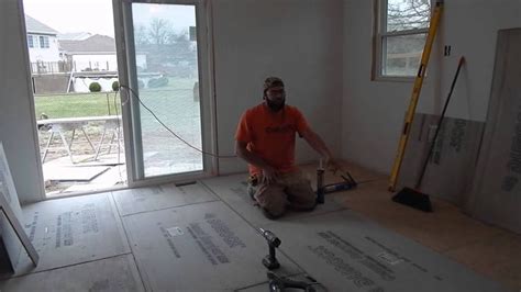 Use caution so you don't cut a joist. Installing cement board subfloor & prepping for tile floor ...