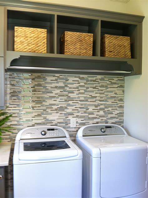 I gave a quick sand to remove the sharp corners. Tile behind washer dryer/rod above | Laundry room remodel ...
