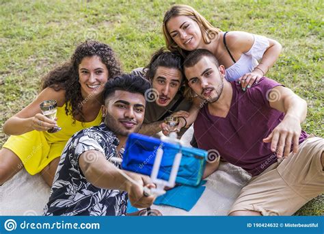 Group Of Millennial Friends Take A Selfie While Celebrating A Birthday