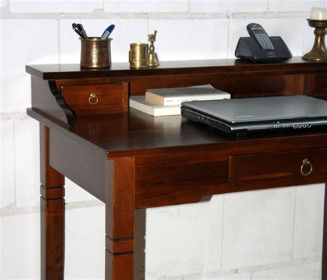 Das innovative denken hinter dem design und der. Schreibtisch nussbaumfarben Sekretär Holz massiv kolonial