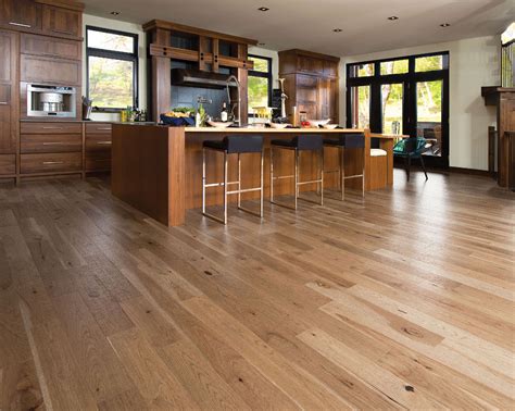 So much happens in a kitchen, no matter who lives in the home. Beautiful wood floors in kitchen! LOVE IT! | Hardwood floors, Flooring, Prefinished hardwood