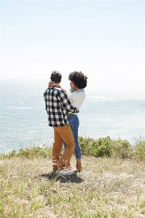 Couple Hugging Outside In Nature By Stocksy Contributor Trinette