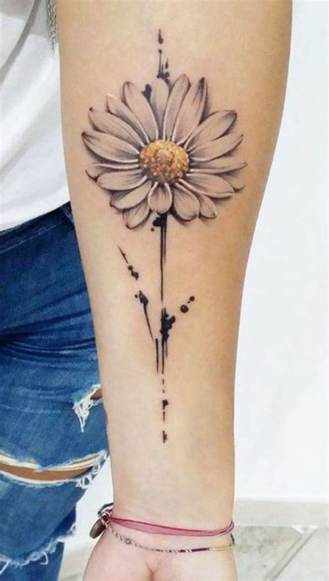 Subtly Colored Daisy Tattoo On The Arm Daisy Tattoo Designs Tattoos For