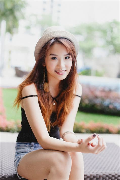 Beautiful Chinese Woman Looking Happy By Jessica Lia Stocksy United