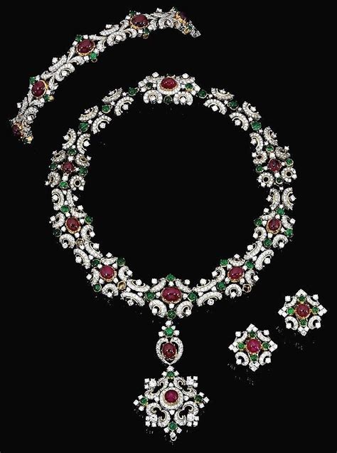 Diamond Necklaces Ruby Emerald And Diamond Parure Comprising A Pendant