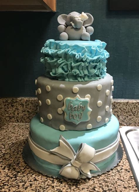 Perhaps you're scouring the internet and just can't come up with the right ideas. Elephant Baby Shower Cake Three tier baby boy elephant ...