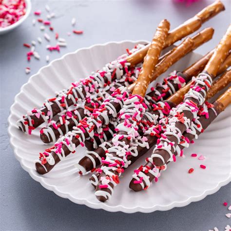Valentines Day Treat Chocolate Covered Pretzel Rods With Sprinkles Stock Image Image Of Heart
