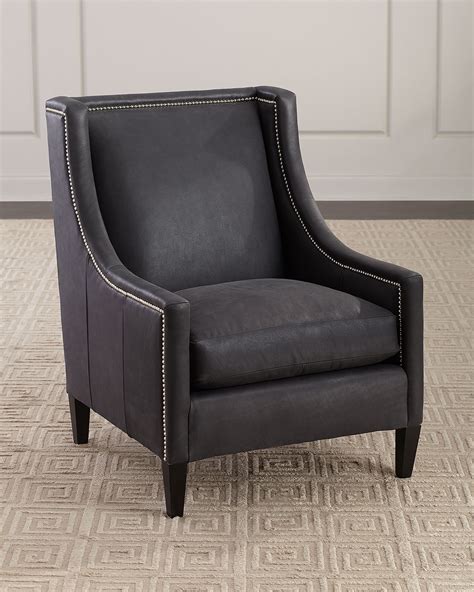 The seat cushion is removable, and the chair stands on four acanthus leaf accented carved paw feet. Bernhardt Mindy Leather Chair | Neiman Marcus