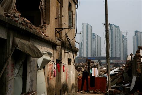 Slum Redevelopment Draws Debate Over Government Debt Housing Prices