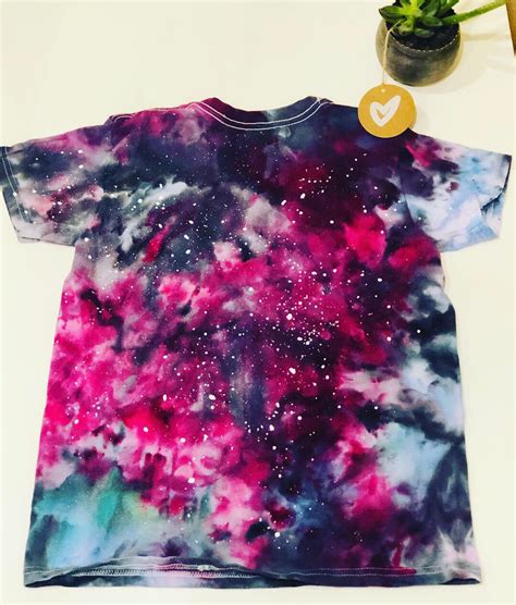 Take your brush and dip in in the paint, wiping off the excess. Tie Dye Adult galaxy tie dye shirt with stars purple and ...