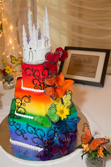 Rainbow Wedding Cake With Castle On Top Rainbow Wedding Theme Rainbow