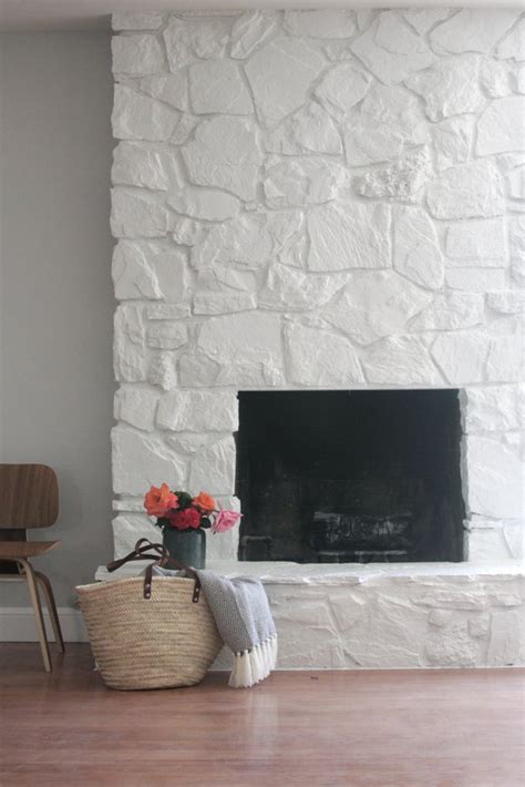 Farmhouse diy has become my hobby and is almost therapeutic for me. How to: Painting the stone fireplace white - Greige Design