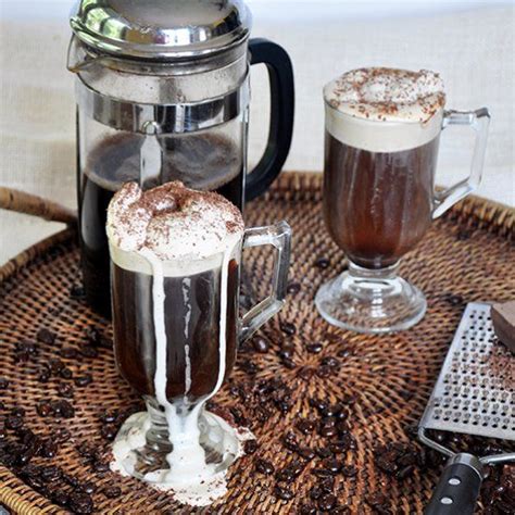 a hot spin on a classic white russian recipe this russian coffee has a delicious kahlua whipped