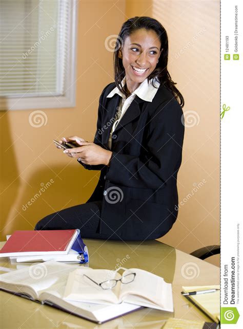 African American Woman Working On Report Stock Image