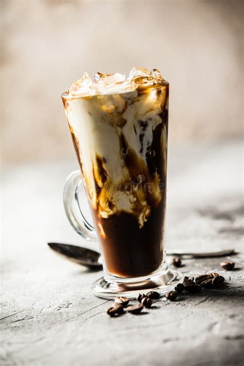 Iced Coffee In A Tall Glass With Cream Poured Over Stock Image Image