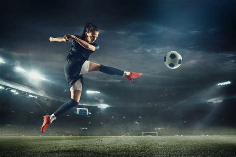 Female Soccer Player Kicking Ball At The Stadium Nonprofit Law Blog