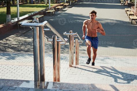Muscular Shirtless Man Have Fitness Day And Running In The City At